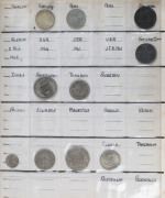 Coins - World : Coin album with selection of circulated world coins incl. Great Britain QV 1894 6d & KEVII 1906 1/- New Zealand 1949 (2) & 1967 Crowns, Sarawak 1863 Brooke 1c, USA 1900, 1921 & 1922 silver dollars, etc; condition variable. (28). - 2