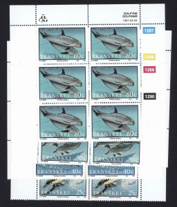 SOUTH AFRICA : HOMELANDS - TRANSKEI: 1982-1994 ex-dealer's stock accumulation in two Boga sheet files, with heavily duplicated sets, some in imprint corner multiples, plus complete panes and sheetlets; mostly MUH, few CTO items retaining full gum; generally very fine condition. Thematically appealing lot which may appeal to resellers. (many 100s).