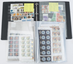 GREAT BRITAIN : POSTAGE: 1970s-90s issues in two binders with 1970-80s Machins including Regionals with multiples to £1 & £2 blocks of 4, the bulk of face value however is in 1980s-90s commemoratives with many large marginal multiples, some with traffic-light imprints; total face value £930+.