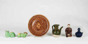 A sgraffito decorated brown glazed dish, 27cm diameter and five other glazed stoneware pieces&nbsp;
