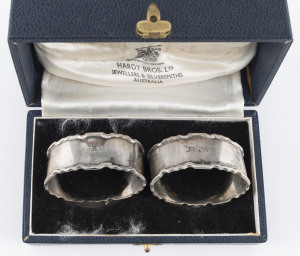 HARDY BROS, a pair of Australian sterling silver napkin rings in original box, early 20th century, 5.5cm across, 58 grams total