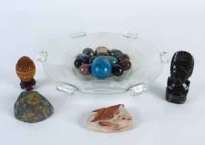 Mineral specimens, stone eggs, leaf fossil, stone statue, glass bowl and egg shaped treen box, 19th/20th century and archaic, the dish 32cm across