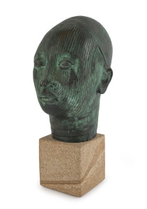 A Thai bronze male bust on sandstone base, 20th century, 40cm high PROVENANCE Purchased from Geraldine Cooper, Melbourne, 1990 for $2,600