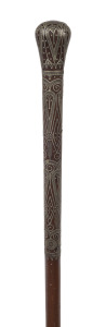 An Indo-Persian walking stick, finely inlaid with silver on timber shaft, 19th century, 88cm high