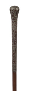An Indo-Persian walking stick, finely inlaid with silver on timber shaft, 19th century, ​88cm high
