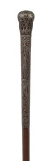 An Indo-Persian walking stick, finely inlaid with silver on timber shaft, 19th century, ​88cm high