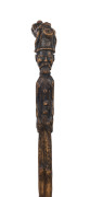 An antique walking stick profusely carved from top to bottom, with nude figural handle, male figure, assorted symbols, flowers and inscription (partially legible) plus metal ferrule, 19th century, 85cm high - 2