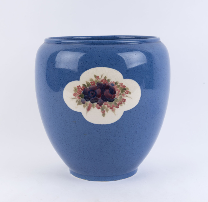 MOORCROFT powder blue porcelain jardiniere with floral vignettes, early 20th century, underglaze green signature "W. Moorcroft", stamped "Moorcroft, Burslem, England", ​26cm high, 24cm wide