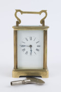 A French carriage clock, brass case with Roman numerals, early 20th century, later key, 14.5cm high