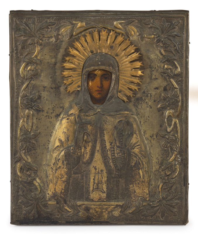 An antique Orthodox icon of the Virgin Mary, hand-painted timber panel with gilded repoussé metal front, 19th century, ​28 x 22cm