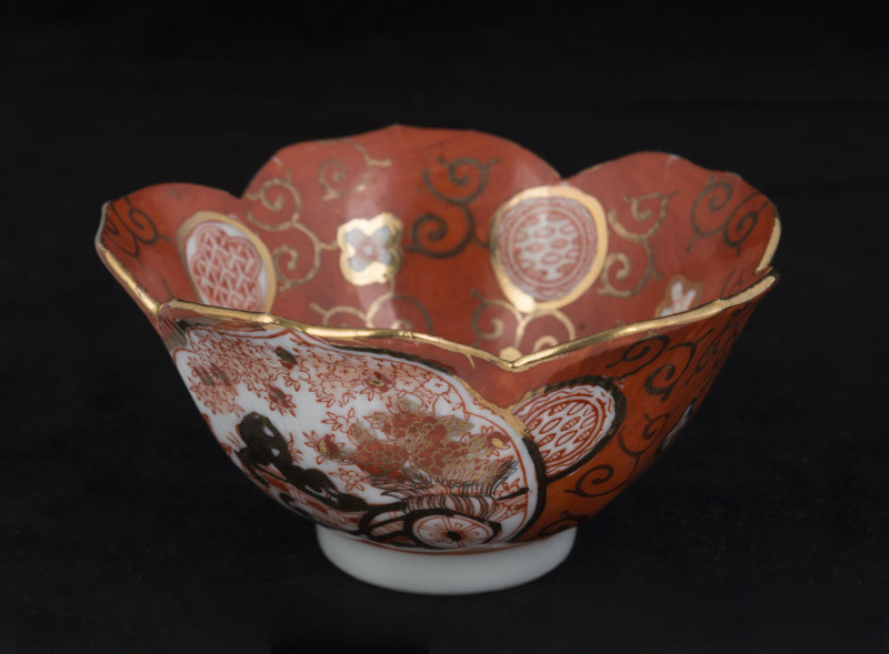 A Japanese Kutani porcelain lotus shaped bowl, Meiji period, 19th century, square seal mark to base, ​6cm high, 11cm wide