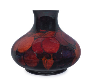 MOORCROFT "WISTERIA" rare flambe pottery vase, circa 1932, impressed stamp "Moorcroft, Made In England", also bearing original paper label "By Appointment Potter To H.M. The Queen", 22cm high, 25cm wide