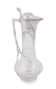 A German Art Nouveau crystal claret jug with silver plated mounts, most likely by ORIVIT, circa 1895, ​30cm high