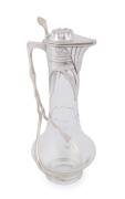 A German Art Nouveau crystal claret jug with silver plated mounts, most likely by ORIVIT, circa 1895, ​30cm high