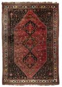A Persian hand-knotted wool rug with red ground, 20th century, ​310 x 210cm