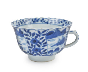 An antique Chinese blue and white porcelain teacup, 18th century, four character mark to base, ​5.5cm high, 10cm wide