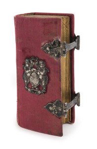 KINGO, Th[omas]. Den forordnede Ny Kirke-Psalme-Bog, [Copenhagen, 1723]. Contemporary silk over wooden boards, marbled end-papers, silver clasps and decorations to upper and lower boards.