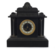 An antique French mantel clock in black slate case with bronze mounts, 15 day time and strike movement, 19th century, with key and pendulum, ​33cm high, 31.5cm wide
