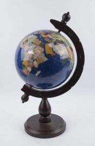 A Chinese globe of the world made from inlaid stone specimens, circa 1990, ​66cm high