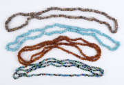 Four assorted vintage bead necklaces, amber, glass, stone and turquoise, 20th century, ​the amber example 124cm long