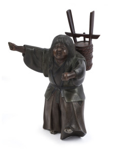 A Japanese patinated bronze statue of a peasant, Meiji period, ​25.5cm high