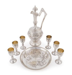 Russian silver drinks set comprising a decanter, six vodka cups and a tray, early 20th century, (8 items), with Cyrillic inscription dated 1914, stamped "84" with Cyrillic maker's mark, the decanter22cm high, 465 grams total