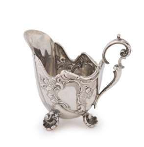 A Russian silver cream jug in the Rococo style, most likely 19th century, stamped "84" with additional export mark to base, 7.5cm high, 8cm wide, 70grams
