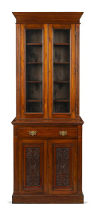 An antique walnut bookcase of slim proportions, late 19th century, 215cm high, 80cm wide, 45cm deep