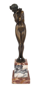 CLAIRE COLINET (1880 - 1950), Darling, circa 1920, bronze on a marble base, signed "Cl. J.R. Colinet", foundry seal inset in base "MHM", 36cm (48cm with base).