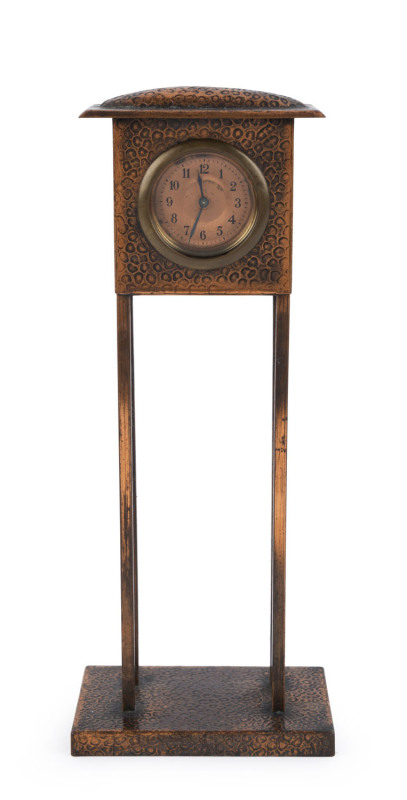 An Arts & Crafts mantel clock with beaten copper case, early 20th century, ​33cm high