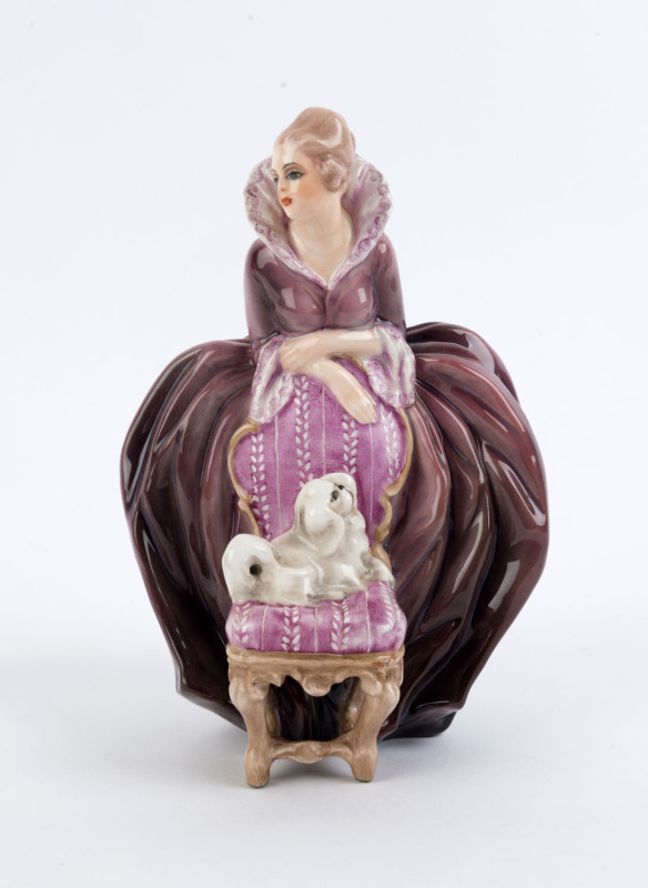 CACCIAPUOTI Italian porcelain statue of a woman with a dog, 20th century, with remains of original paper label to base, incised "Cacciapuoti", ​22cm high