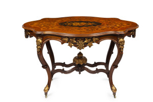 A French centre table, rosewood and kingwood with gilt decorated highlights, 19th century, 78cm high, 127cm wide, 81cm deep