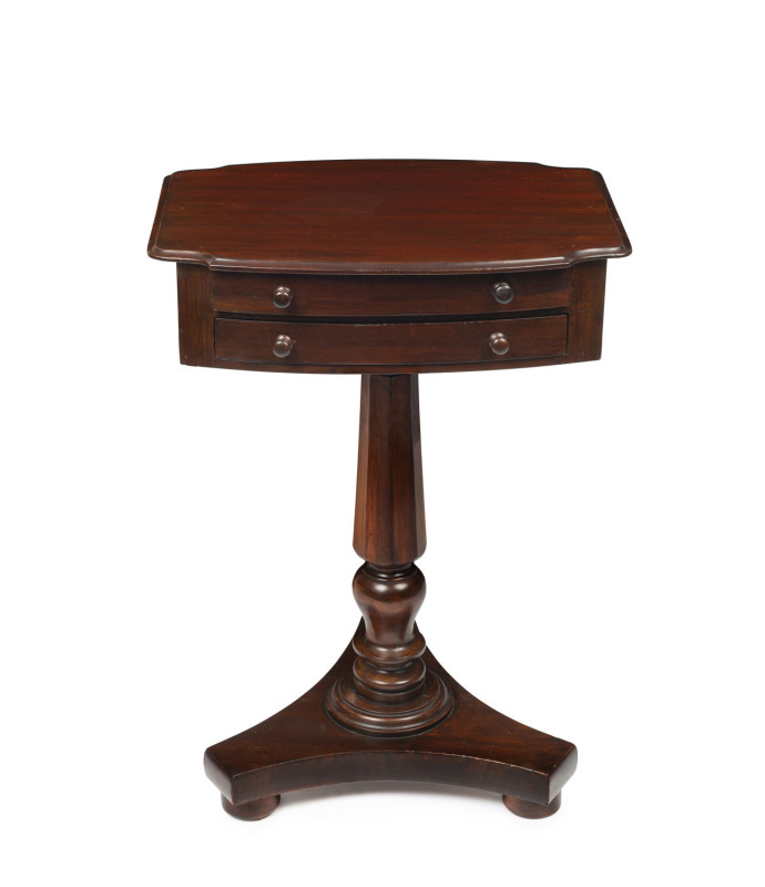 An antique two drawer occasional table on tripartite concave base, Australian cedar, red pine and kauri pine, platform base with bun feet and octagonal column, 19th century, 69cm high, 49cm wide, 37cm deep