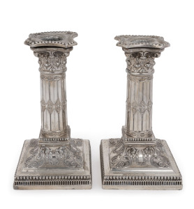 A Victorian silver plate pair of column candlesticks, circa 1880, made by James Dixon & Sons, ​16.5cm high. (2).