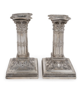 A Victorian silver plate pair of column candlesticks, circa 1880, made by James Dixon & Sons, 16.5cm high. (2).