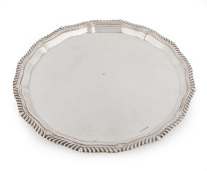 A Victorian sterling silver circular tray with gadrooned rim, by Mappin & Webb Ltd., 1894,