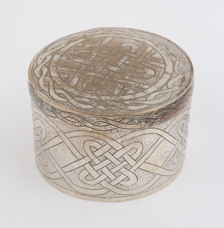 A silver circular lidded box with engraved decorations by Aikin Amadu, Kano (Nigeria), circa 1960s, 7cm high, 10cm diameter, 150 grams.