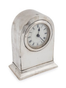 A sterling silver cased clock by William Neale, Chester, 1904, with personalized message dated June 1905 engraved verso. 13.5cm high.