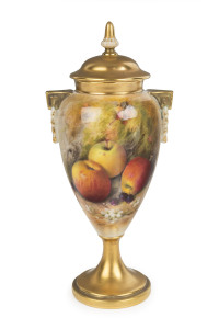 ROYAL WORCESTER English porcelain urn decorated with fruit and flowers, signed "RICKETTS", circa 1929, purple factory mark to base, 20cm high