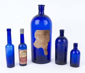 Five antique Bristol blue glass bottles, 19th century, ​the largest 33cm high