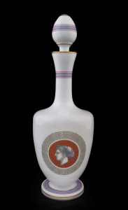 An antique French milk glass decanter with neo-classical profile portraits, 19th century, stamped "Made in France", 23cm high