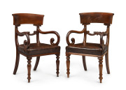 A pair of antique English carver chairs, flame mahogany with brown leatherette upholstery, circa 1840, ​52cm across the arms