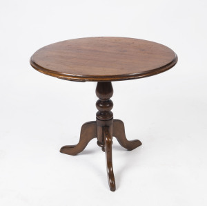 A circular occasional table, blackwood and huon pine, Tasmanian origin, 19th century, cut down from a wine table, 48cm high, 54cm diameter