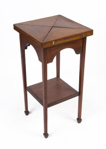 An envelope top games table, Australian hardwood, circa 1920, 77cm high, 38cm wide, 38cm deep (extends to 54cm wide, 54cm deep)