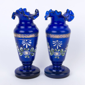 A pair of English Bristol blue glass mantel vases with enamel floral decoration, 19th century, 26cm high