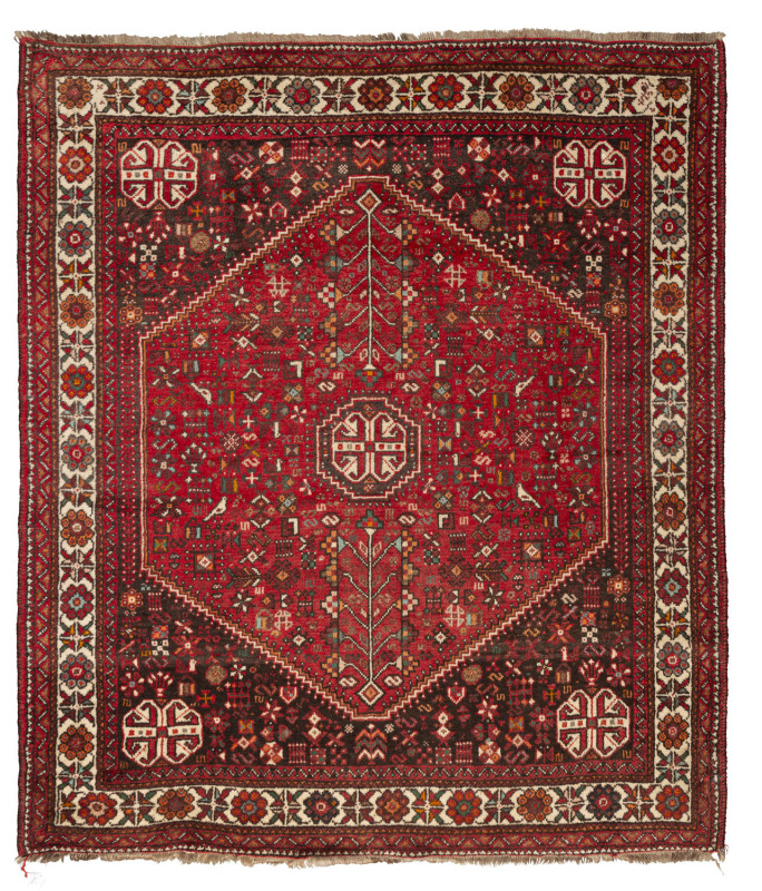 A Persian hand-knotted red patterned rug, ​204 x 175cm