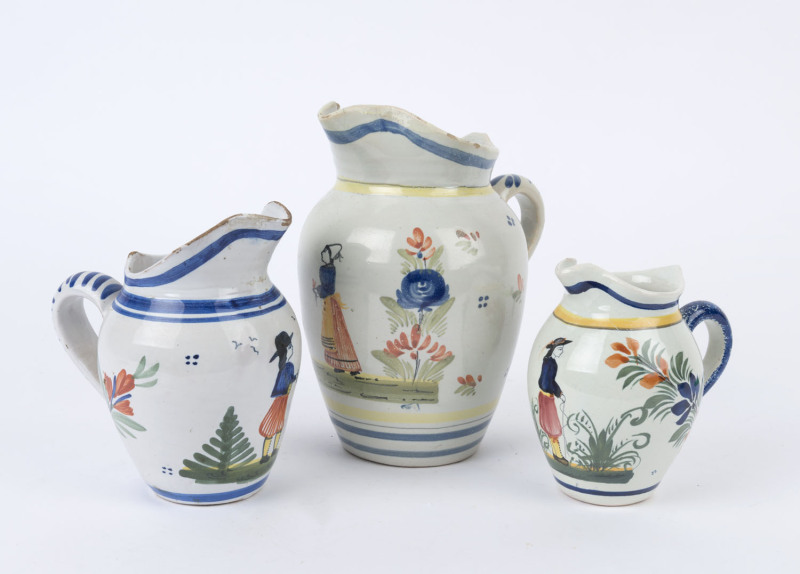 QUIMPER three assorted French earthenware jugs, 19th and early 20th century, the largest 21cm high