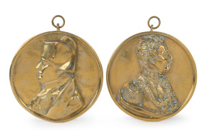 NAPOLEON and WELLINGTON pair of brass commemorative plaques, 19th century, 17.5cm diameter