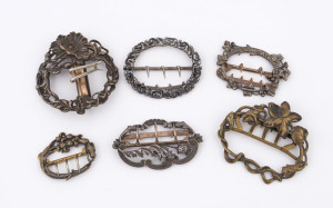 Six assorted antique French silver and plated buckles, 19th century, the largest 7cm high