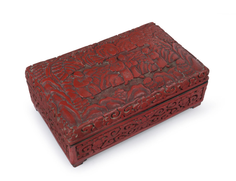 An antique Chinese cinnabar lacquer box, Qing Dynasty, 6cm high, 15cm wide, 9cm deep